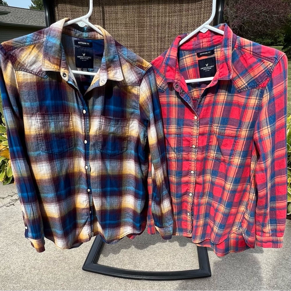 Pack of 2.  Woman’s American Eagle long sleeve flannel shirts
